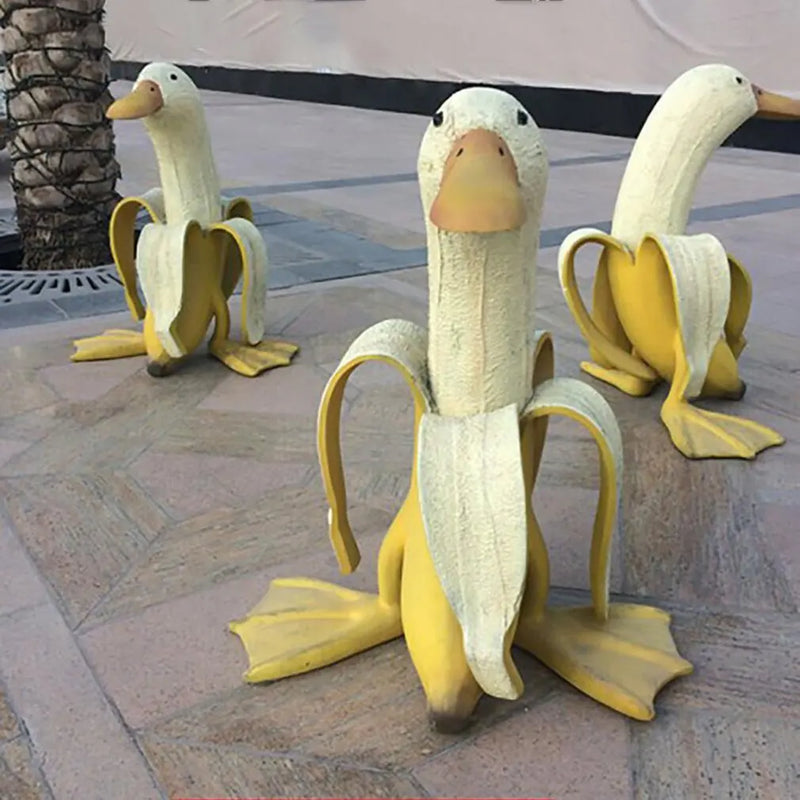 Estátua decorativa pato banana